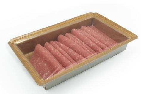 Упаковка в картонные лотки на термоформере